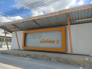 Exterior front view of a commercial building with signage