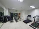 Spacious home gym with a variety of fitness equipment