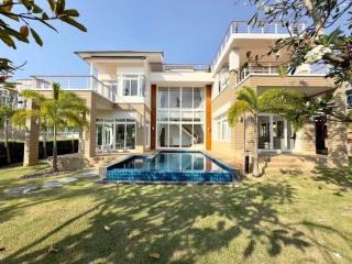 Modern two-story house with pool and garden