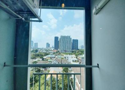 View from a high-rise building window overseeing the cityscape