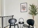 Minimalist interior design in a well-lit building space with chairs and decorative plant