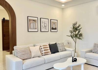 Modern living room with neutral tones and stylish decor