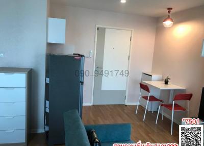 Compact and well-furnished apartment living space with modern amenities
