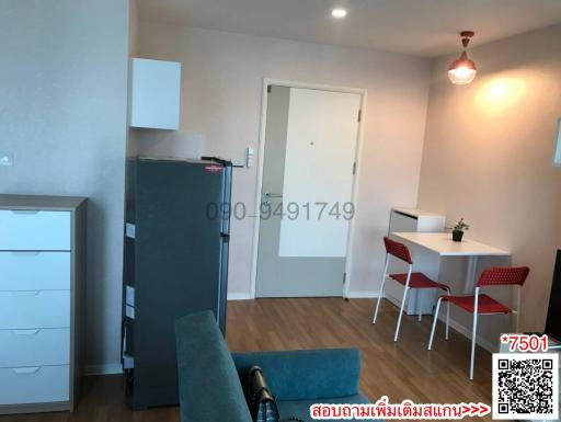 Compact and well-furnished apartment living space with modern amenities