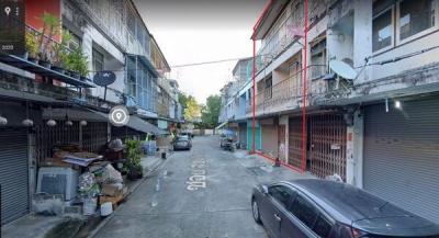 Narrow street with residential buildings