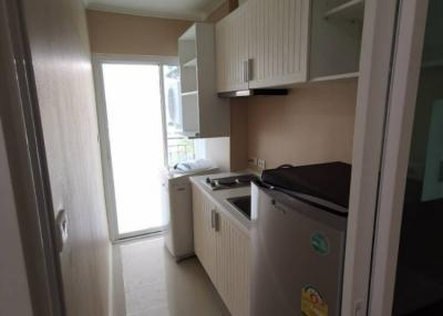 Compact kitchen with modern appliances and ample cabinetry