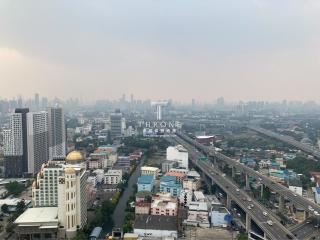 Aerial view of cityscape with buildings and roads