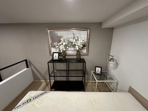 Elegant hallway with decorative table and artwork