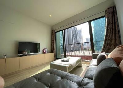 Modern living room interior with large windows and city view