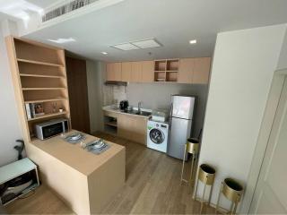 Compact modern kitchen with built-in appliances