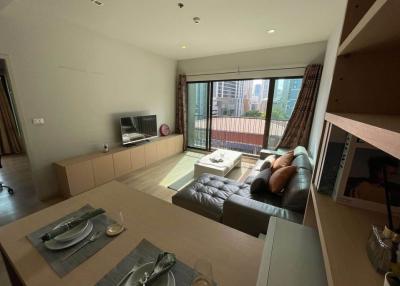 Modern and spacious living room interior with large windows