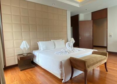 Elegantly designed bedroom with king-size bed and modern amenities