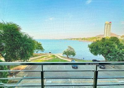 View from the balcony overlooking the lake with safety railing