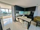 Modern kitchen with integrated dining area and ocean view