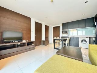 Modern open-plan living room with kitchen and dining area