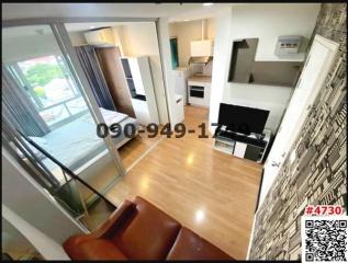 Bright and modern open-plan living room with balcony access