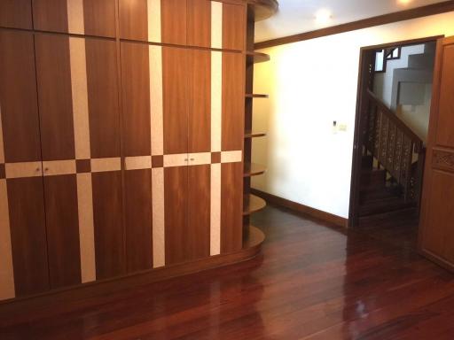 Wooden staircase with built-in storage in a residential home