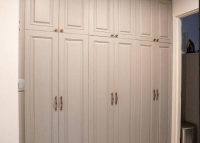 Large built-in wardrobe in a modern interior