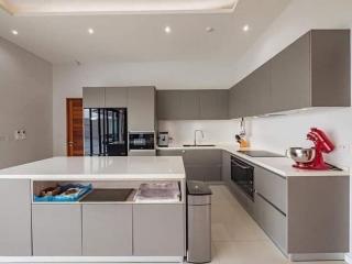 Modern kitchen with stainless steel appliances and center island