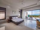 Spacious bedroom with large bed, glossy floor tiles, and a scenic view