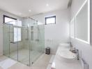 Spacious modern bathroom with large walk-in shower and white interiors