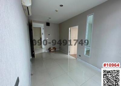 Spacious and bright empty living room with tiled flooring