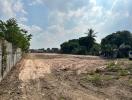 Vacant land ready for development with clear skies