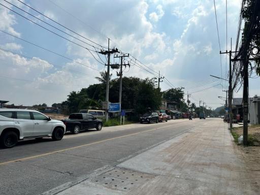 Street view outside the property with visible road and surrounding buildings