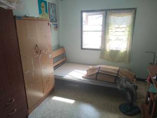 Modest bedroom with natural lighting