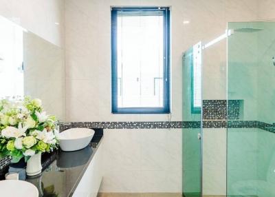 Modern bathroom with glass shower and elegant design