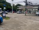 Street view with convenience store and parking area