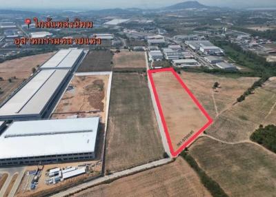 Aerial view of industrial land for sale near manufacturing complexes