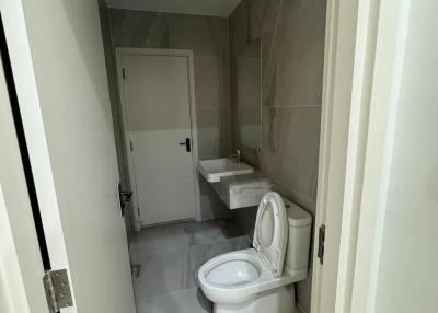 Modern bathroom interior with marble tiles and elegant fixtures