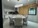 Modern kitchen with dining area and natural light