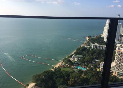 Stunning ocean view from a high-rise apartment balcony