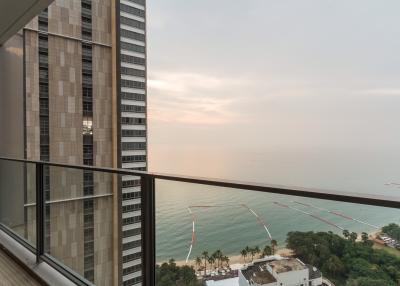 High-rise apartment balcony overlooking the beach