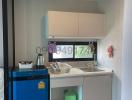 Compact kitchenette with modern appliances