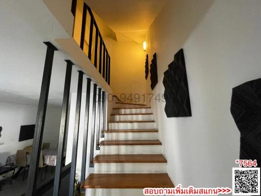 Modern staircase in a well-lit home interior