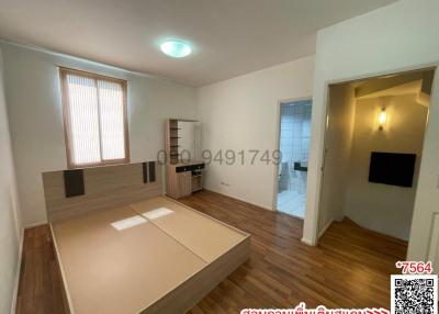 Spacious bedroom with attached kitchen and open layout