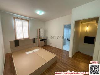 Spacious bedroom with attached kitchen and open layout