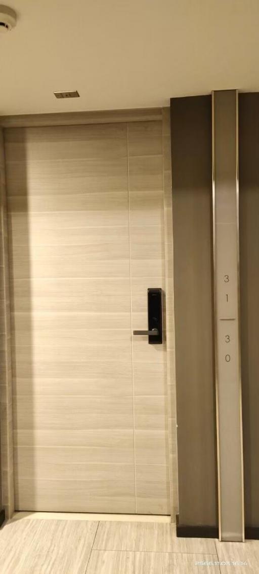 Modern apartment building elevator with digital access panel