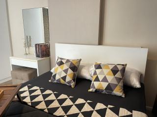 Elegant bedroom with neutral color palette and modern design