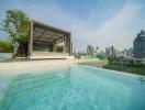 Luxurious rooftop swimming pool with city skyline view and lounge area