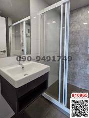 Modern bathroom with glass shower and sink