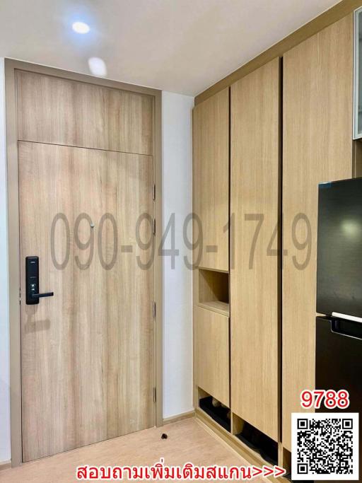 Modern wooden wardrobe and door in a compact building interior