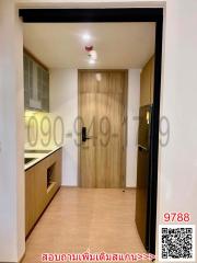 Modern kitchen interior with wooden finish and laminate flooring