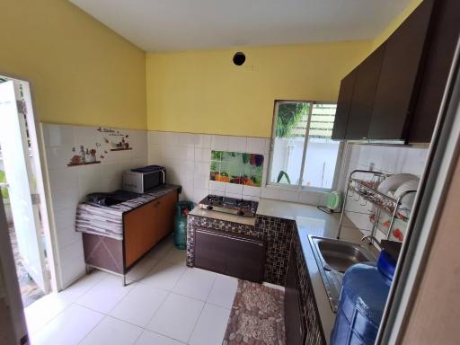 Spacious kitchen with modern appliances and ample natural light