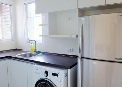 Bright modern kitchen with stainless steel appliances