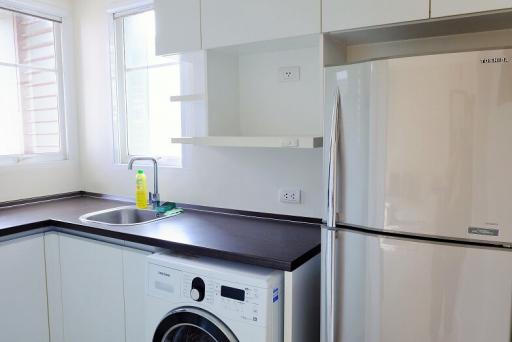 Bright modern kitchen with stainless steel appliances