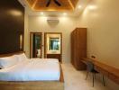 Elegant modern bedroom with wooden accents and en suite bathroom
